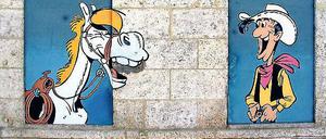 Starkes Team. Lucky Luke und sein Pferd Jolly Jumper, hier auf einem Wandbild in Angoulême. 