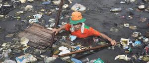 Verstopft. Die Bewohner Jakartas leiden auch unter Müll- und Luftverschmutzung.