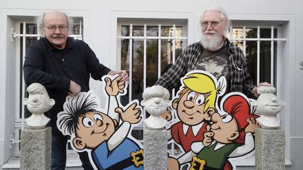Klaus Schleiter und Jörg Reuter mit den Figuren der Abrafaxe aus der Comiczeitschrift Mosaik.