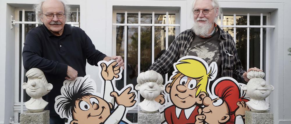 Klaus Schleiter und Jörg Reuter mit den Figuren der Abrafaxe aus der Comiczeitschrift Mosaik.