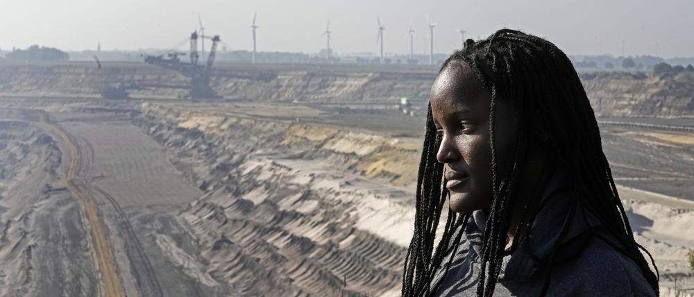 Climate activist Vanessa Nakate from Uganda during her visit to the Garzweiler open-cast coal mine in Luetzerath, western Germany, Saturday, Oct. 9, 2021. Garzweiler, operated by utility giant RWE, has become a focus of protests by people who want Germany to stop extracting and burning coal as soon as possible. (AP Photo/Martin Meissner)