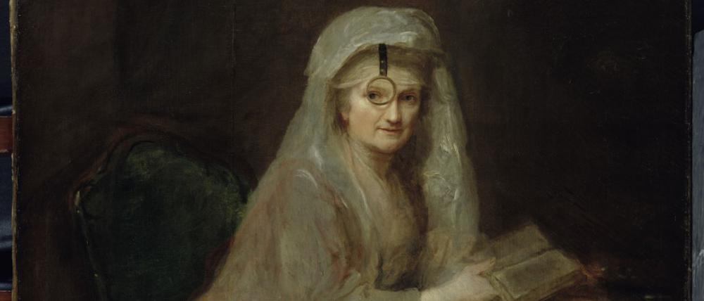 In den Blick genommen. Mit Sehhilfe malte sich Anna Dorothea Therbusch 1776/77 in ihrem Autoporträt, das heute zu den Hauptwerken der Berliner Gemäldegalerie gehört. Die Künstlerin fokussiert ihre Betrachter:innen durch ein kreisrundes Einglas.