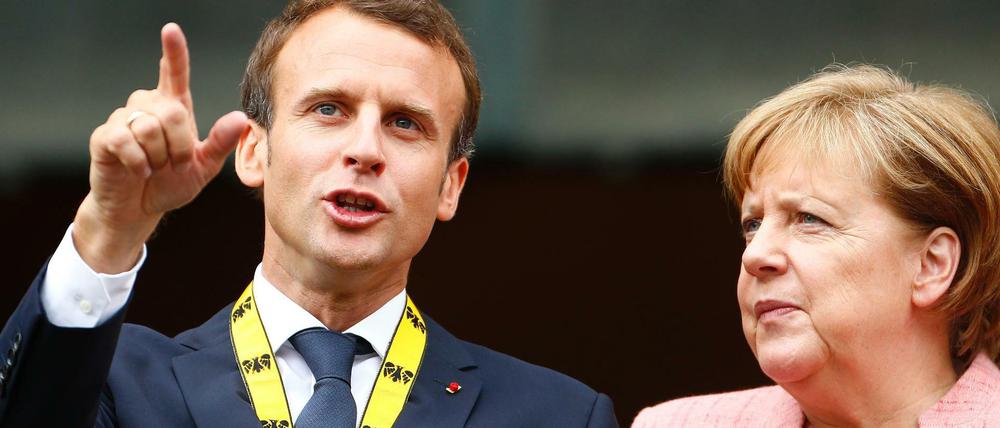 Der Retter und die große Lautlose: Die Franzosen haben Macron, uns bleibt nur Merkel.