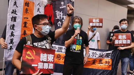 Soziale Demokraten gegen den Kommunismus. Eine in Richtung Peking adressierte Demonstration Hongkonger Aktivisten nach der Verabschiedung des neuen chinesischen Sicherheitsgesetzes (1.7.2020). 