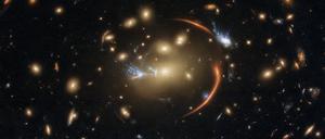 The centre of this image from the NASA/ESA Hubble Space Telescope is framed by the tell-tale arcs that result from strong gravitational lensing, a striking astronomical phenomenon which can warp, magnify, or even duplicate the appearance of distant galaxies.  Gravitational lensing occurs when light from a distant galaxy is subtly distorted by the gravitational pull of an intervening astronomical object. In this case, the relatively nearby galaxy cluster MACSJ0138.0-2155 has lensed a significantly more distant quiescent galaxy — a slumbering giant known as MRG-M0138 which has run out of the gas required to form new stars and is located 10 billion light years away. Astronomers can use gravitational lensing as a natural magnifying glass, allowing them to inspect objects like distant quiescent galaxies which would usually be too difficult for even Hubble to resolve. This image was made using observations from eight different infrared filters spread across two of Hubble’s most advanced astronomical instruments: the Advanced Camera for Surveys and the Wide Field Camera 3. These instruments were installed by astronauts during the final two servicing missions to Hubble, and provide astronomers with superbly detailed observations across a large area of sky and a wide range of wavelengths. Links  Video of Cosmic Lens Flare 